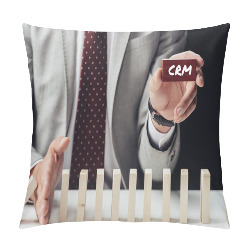 Personality  Partial View Of Businessman Holding Brick With 'crm' Word And Preventing Wooden Blocks From Falling Pillow Covers