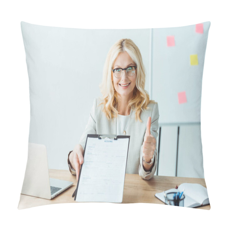 Personality  Cheerful Blonde Woman In Glasses Showing Thumb Up And Holding Clipboard  Pillow Covers