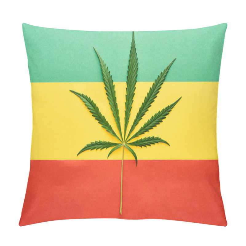 Personality  Top View Of Cannabis Leaf On Rastafarian Flag Background Pillow Covers