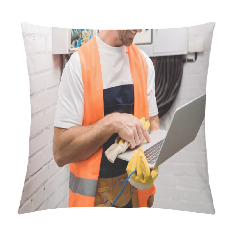 Personality  Cropped View Of Smiling Electrician Holding Glove And Using Laptop  Pillow Covers