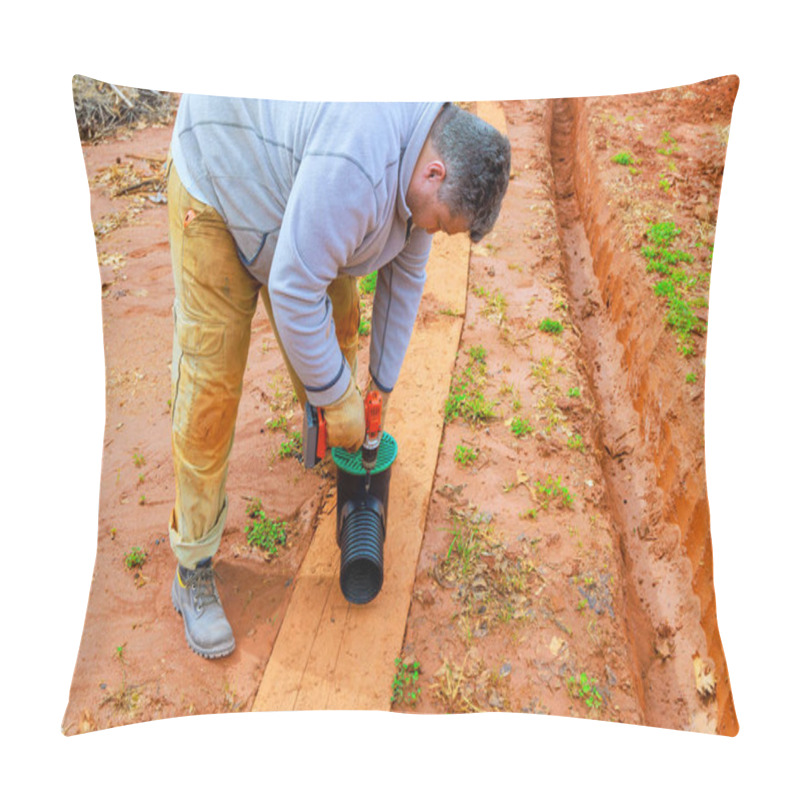 Personality  Man Is Fixing Drainage Pipe For Enhance Water Flow Management In Freshly Dug Earth Trench Pillow Covers