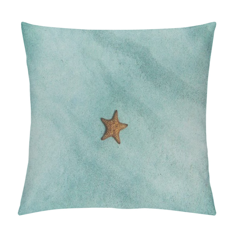 Personality  A Vibrant Orange Starfish Resting On A Sandy Ocean Floor. Pillow Covers