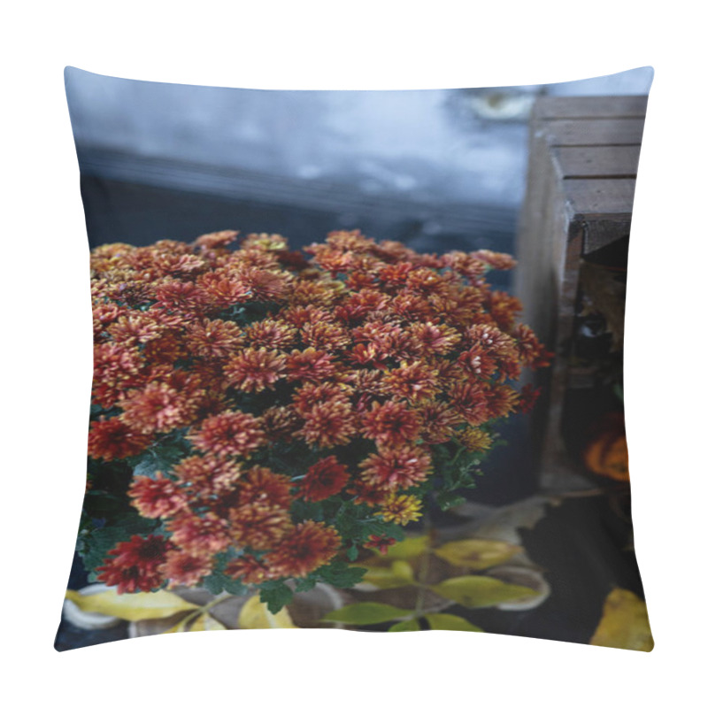 Personality  Bright Red And Orange Chrysanthemums Flourish Next To A Weathered Wooden Crate, With Scattered Yellow Leaves Complementing The Warm Autumn Atmosphere Indoors. Pillow Covers