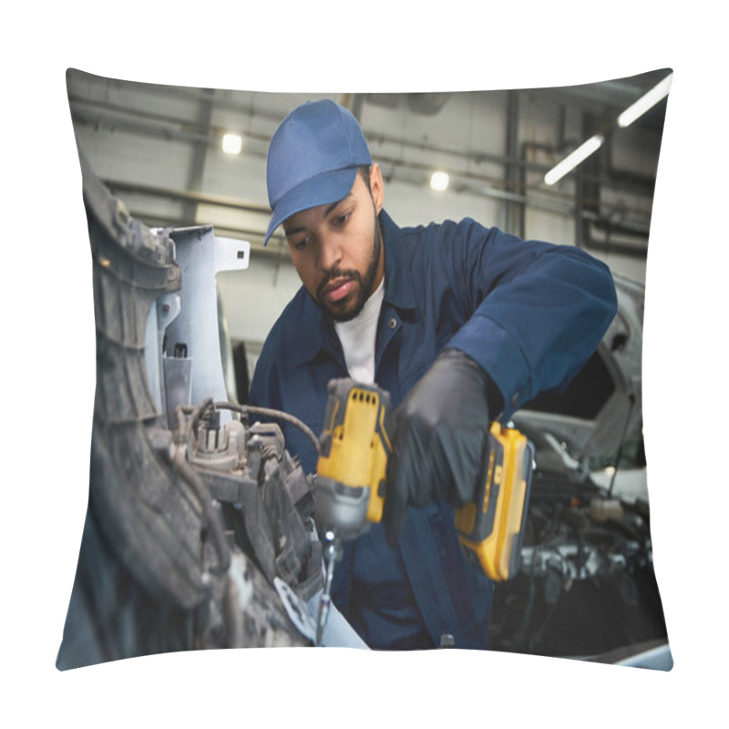 Personality  A Skilled Mechanic Uses Power Tools Diligently On A Vehicle In A Bright Workshop. Pillow Covers