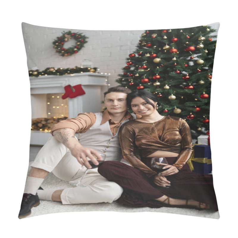 Personality  Cheerful Man And Happy Asian Woman Holding Glasses Of Wine While Sitting Under Christmas Tree  Pillow Covers