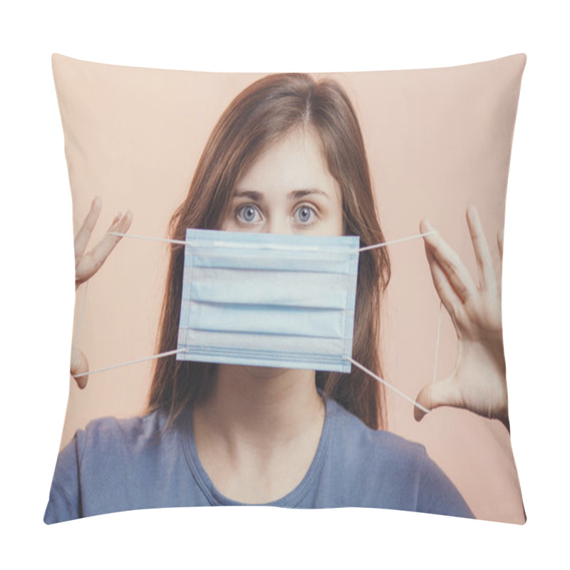 Personality  Portrait Of Young Woman Showing Opened Medical Flu Mask Covering Face On Colored Studio Background, Girl Looking With Scared Eyes, Quarantine Measures Pillow Covers