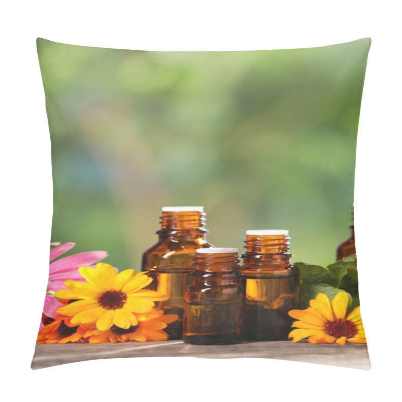 Personality  Bottles With Essential Oils And Flowers On Wooden Table Against Blurred Green Background. Space For Text Pillow Covers