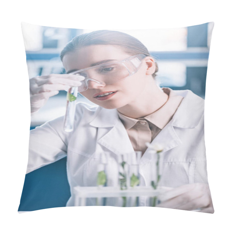 Personality  Selective Focus Of Attractive Biochemist In Goggles Holding Test Tube With Green Plant Pillow Covers