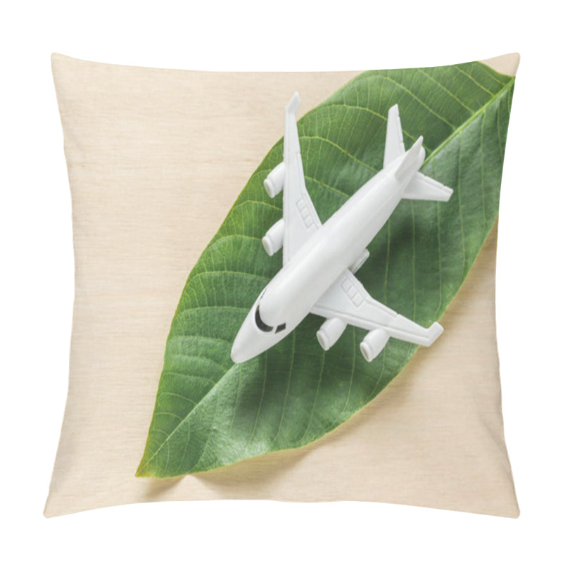 Personality  White Airplane On Fresh Green Leaves. Net Zero Carbon Freighter Flights Concept. Sustainable Aviation Fuel Pillow Covers