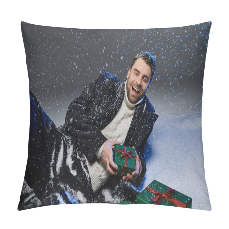 Personality  A Cheerful Young Man Enjoys Playing In The Snow With Green Wrapped Gifts Around Him. Pillow Covers