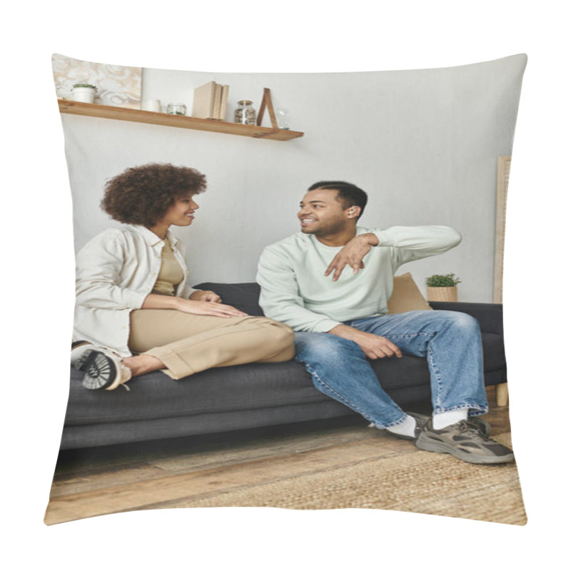 Personality  An African American Couple Sits On A Couch At Home, Communicating Through Sign Language. Pillow Covers