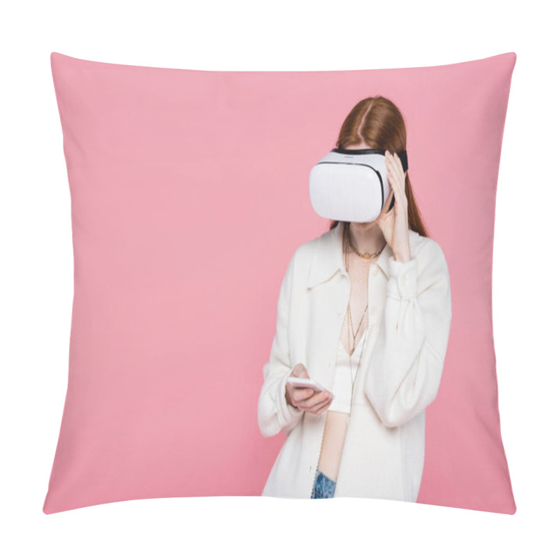 Personality  Redhead Woman Using Virtual Reality Headset And Using Smartphone Isolated On Pink  Pillow Covers