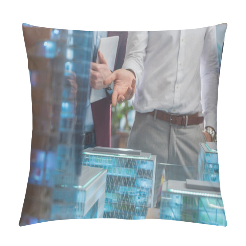 Personality  Cropped Shot Of Businessman Showing Miniature Model Of Modern City To Clients Pillow Covers