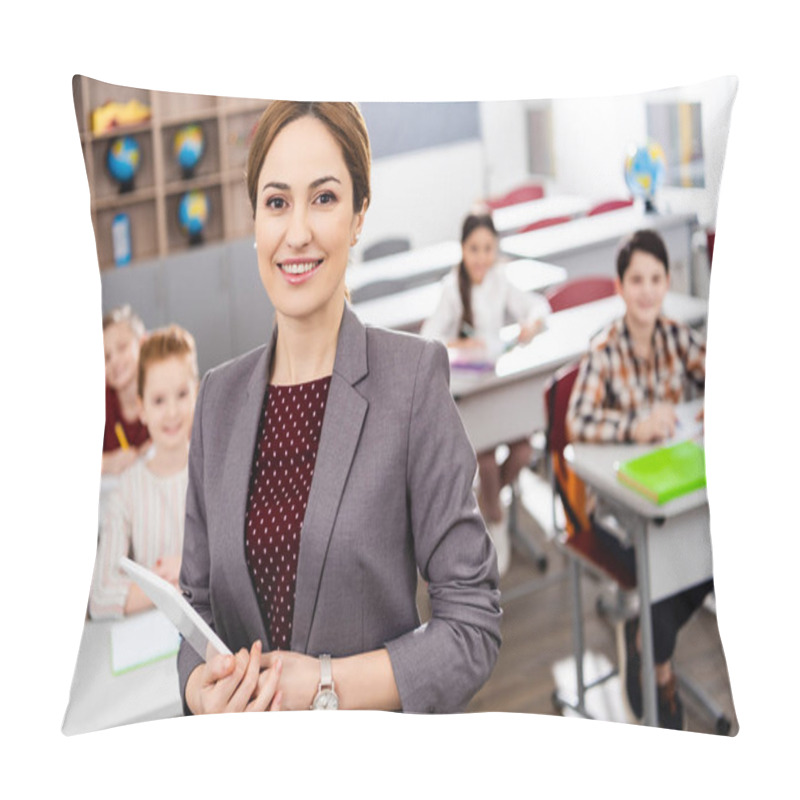 Personality  Smiling Teacher With Digital Tablet Standing In Front Of Pupils And Looking At Camera Pillow Covers