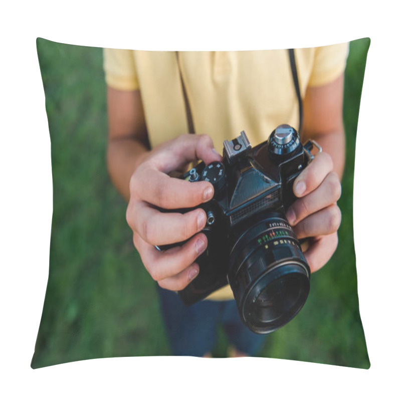 Personality  Cropped View Of Kid Holding Digital Camera In Hands  Pillow Covers