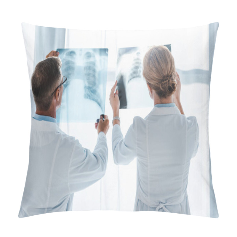 Personality  Doctor In Glasses And Coworker Standing And Looking At X-rays In Clinic  Pillow Covers