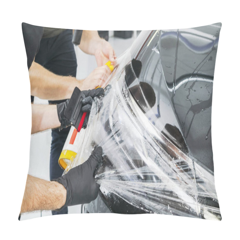 Personality  Car Wrapping Specialist Putting Vinyl Foil Or Film On Car. Protective Film. Applying A Protective Film With Tools For Work. Car Detailing. Transparent Film. Car Paint Protection. Trimming.  Pillow Covers