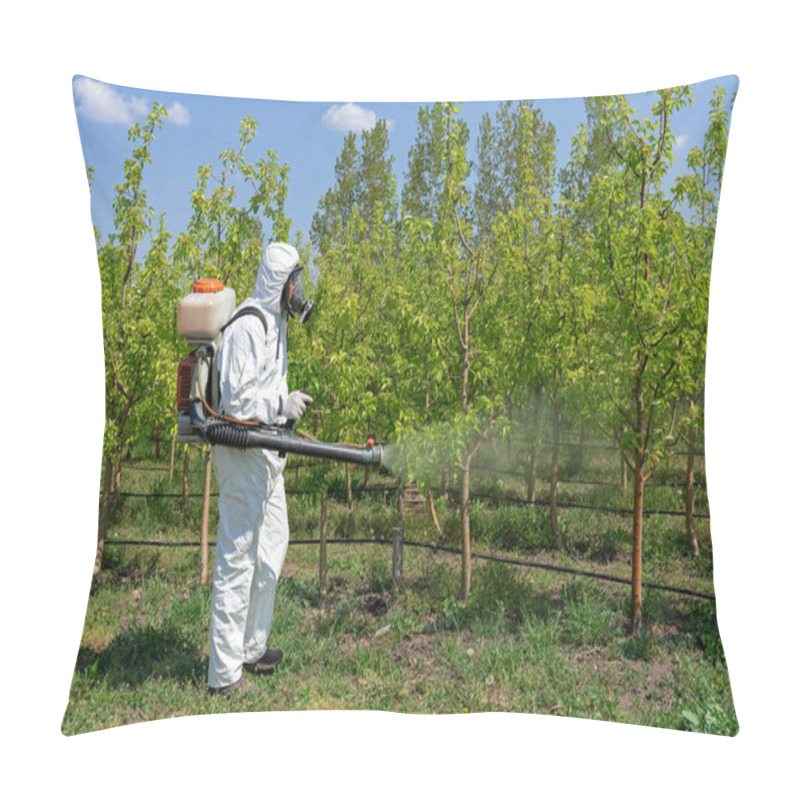 Personality  Farmer In Protective Equipment Spraying Fruit Orchard With Backpack Atomizer Sprayer. Man In Coveralls With Gas Mask Spraying Orchard In Springtime. Farmer Sprays Trees With Toxic Pesticides Or Insecticide. Pillow Covers