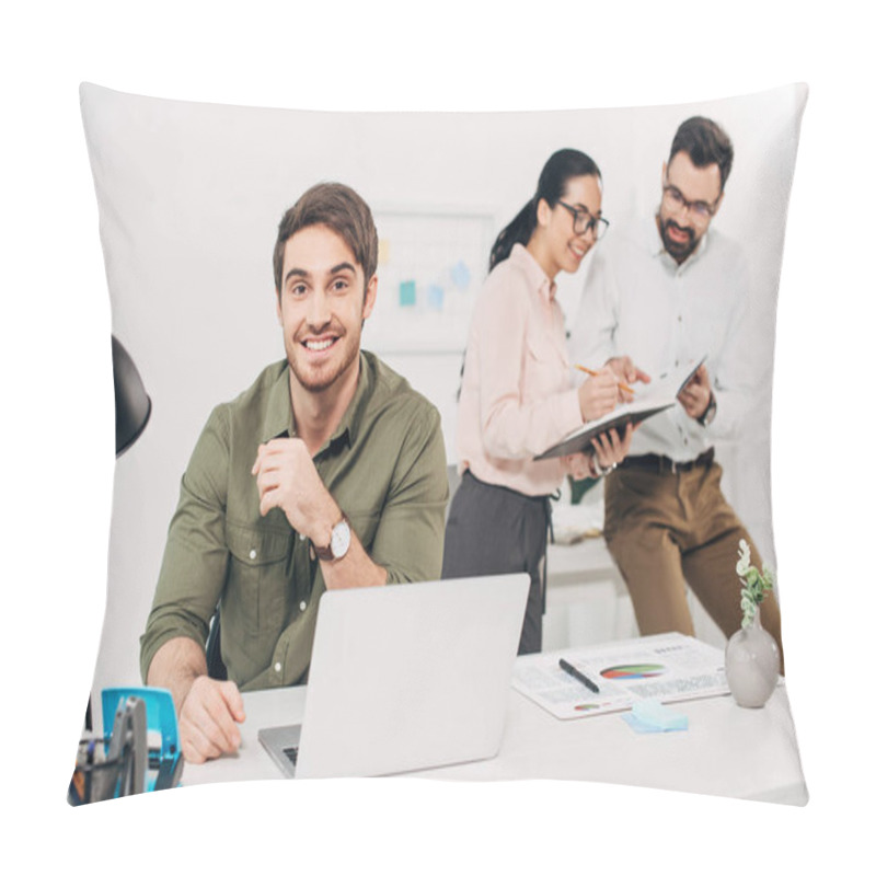 Personality  Selective Focus Of Male Office Manager Sitting And Smiling With Colleagues On Background  Pillow Covers