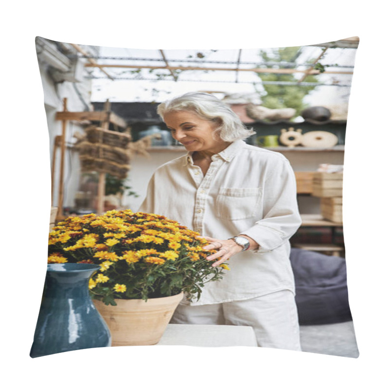 Personality  A Beautiful Mature Woman Tends To A Large Pot Of Blooming Flowers, Surrounded By Rustic Decor. Pillow Covers