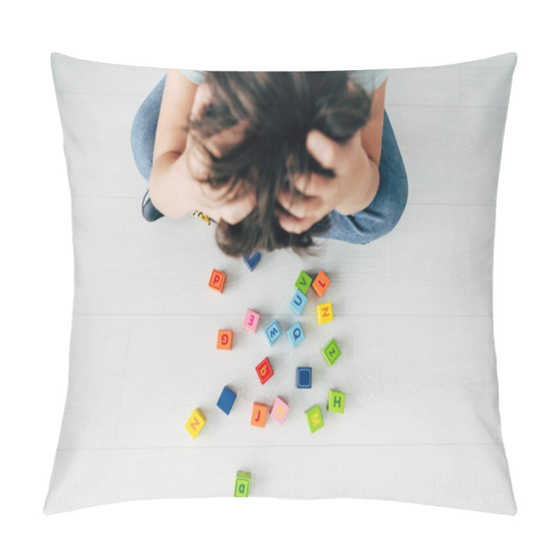 Personality  Top View Of Sad Kid With Dyslexia Sitting Near Building Blocks Pillow Covers