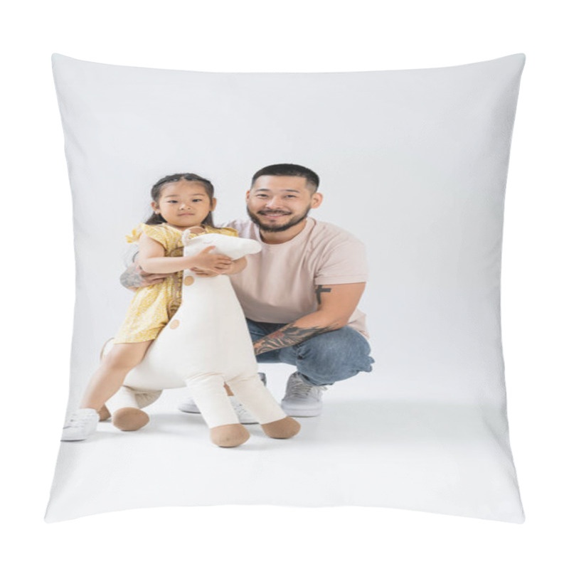 Personality  Full Length Of Happy Asian Kid Holding Toy Giraffe And Standing Near Tattooed Father On Grey Pillow Covers