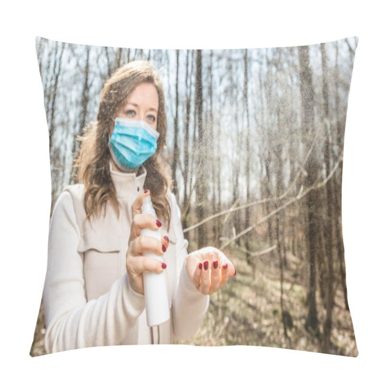 Personality  Woman Wearing Respirator Mask And Spraying Hand Sanitizer While Walking In The Park. Corona Virus Protection Concept Pillow Covers