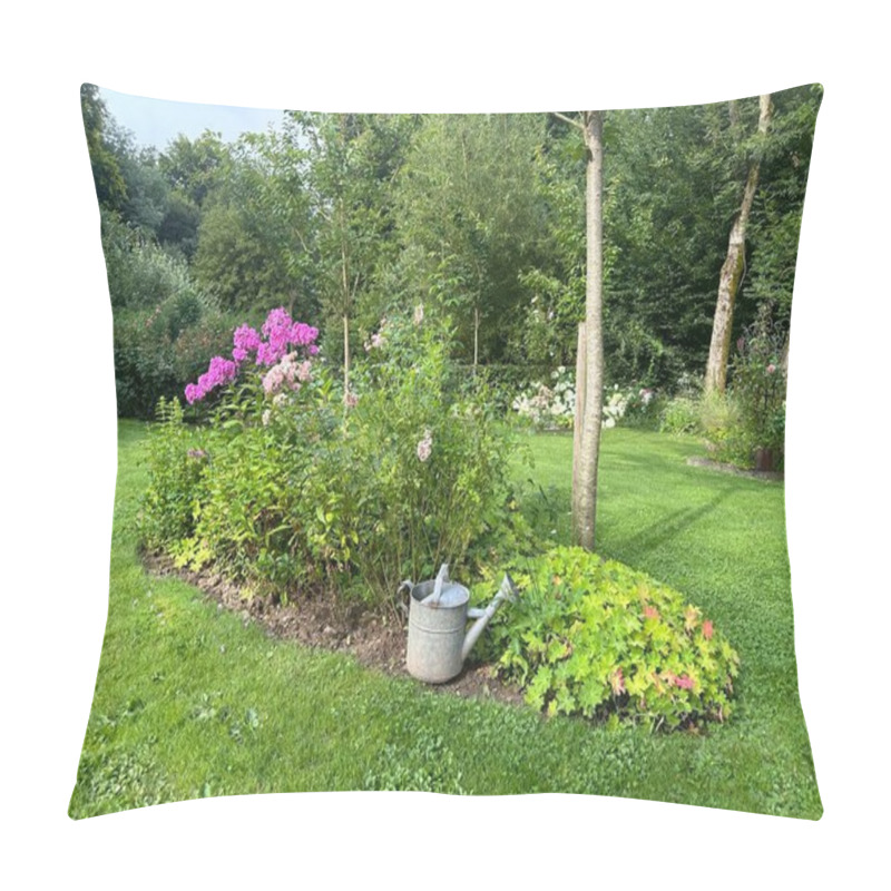 Personality  Flower Bed Landscape Near The Tree With Watering Can. Vibrant Pink Flox, Delicate Robinia, And Geranium Create A Colorful Display. Gardens 