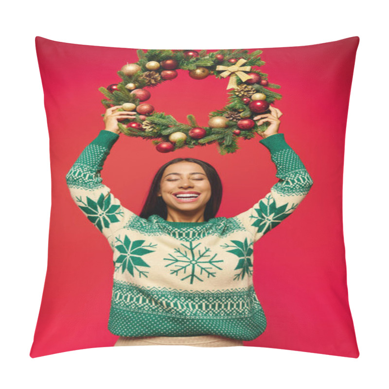 Personality  The Young Woman Beams With Happiness As She Lifts A Vibrant Holiday Wreath In Celebration. Pillow Covers