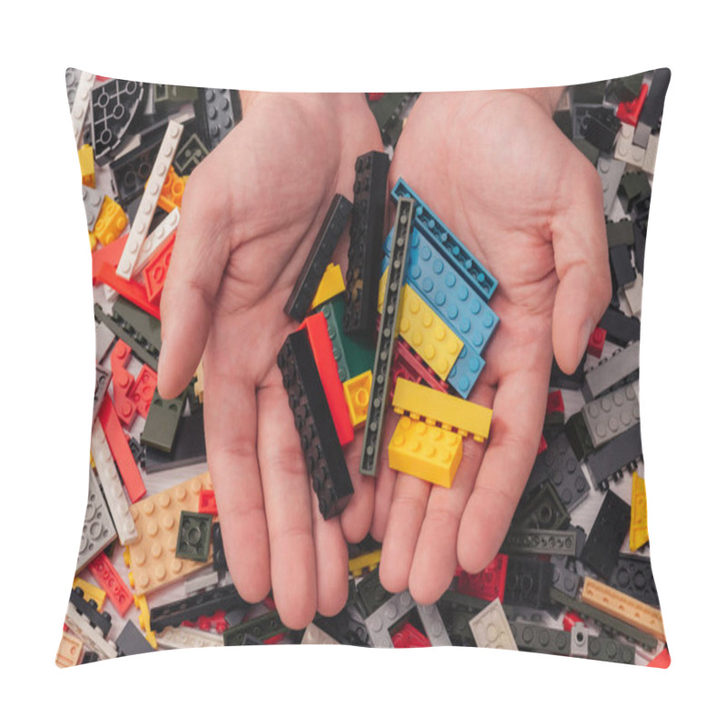 Personality  KYIV, UKRAINE - MARCH 15, 2019: Cropped View Of Man Holding In Hands Colorful Lego Blocks  Pillow Covers