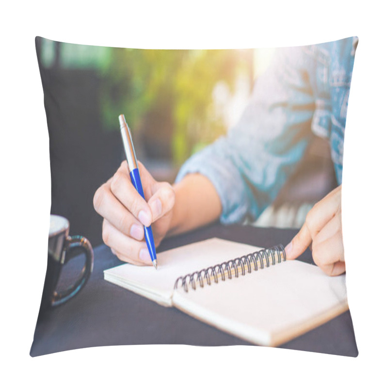 Personality  Woman Hand Is Writing On A Note Pad With A Pen In The Office. Pillow Covers