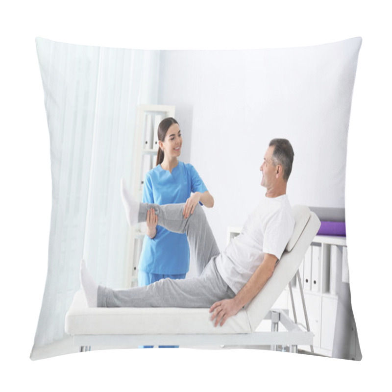 Personality  Doctor Working With Patient In Hospital. Rehabilitation Physiotherapy Pillow Covers