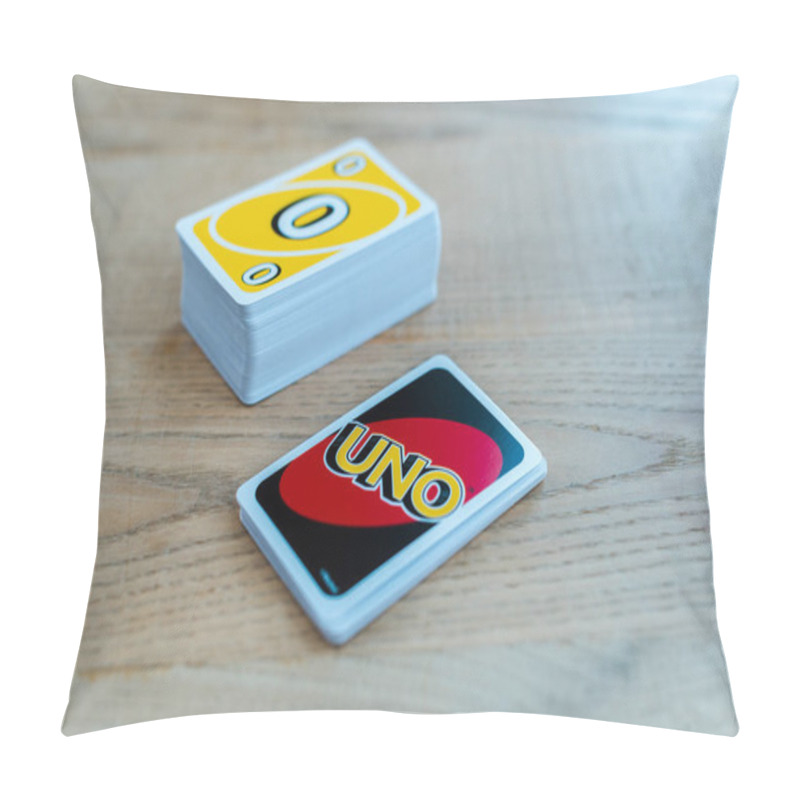 Personality  KYIV, UKRAINE - NOVEMBER 22, 2019: Selective Focus Of Uno Letters On Playing Card Near Stack On Wooden Table  Pillow Covers