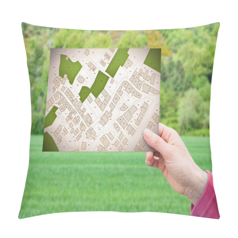 Personality  Land Plot Management - Real Estate Concept With A Vacant Land On A Green Residential Area Available For Building Construction With Hand Holding A Postcard About An Imaginary Cadastral Map Pillow Covers