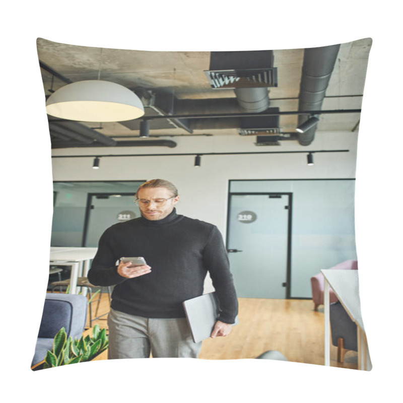 Personality  Serious And Stylish Entrepreneur In Eyeglasses And Black Turtleneck Holding Laptop And Networking On Smartphone In Contemporary Office With High Tech Interior, Successful Business Concept Pillow Covers