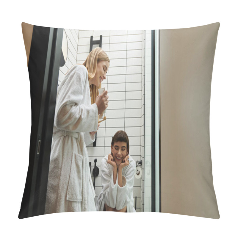 Personality  A Woman In A Bathrobe Brushes Her Teeth While Her Partner Watches In A Hotel Bathroom. Pillow Covers