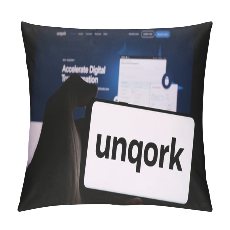 Personality  Stuttgart, Germany - 08-25-2024: Person Holding Mobile Phone With Logo Of US Enterprise Application Platform Company Unqork Inc. In Front Of Web Page. Focus On Phone Display. Pillow Covers