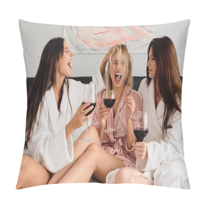 Personality  Group Of Young Attractive Smiling Women In Bathrobes Playfully Drinking Red Wine Sitting Together On Bed In Modern Hotel Pillow Covers