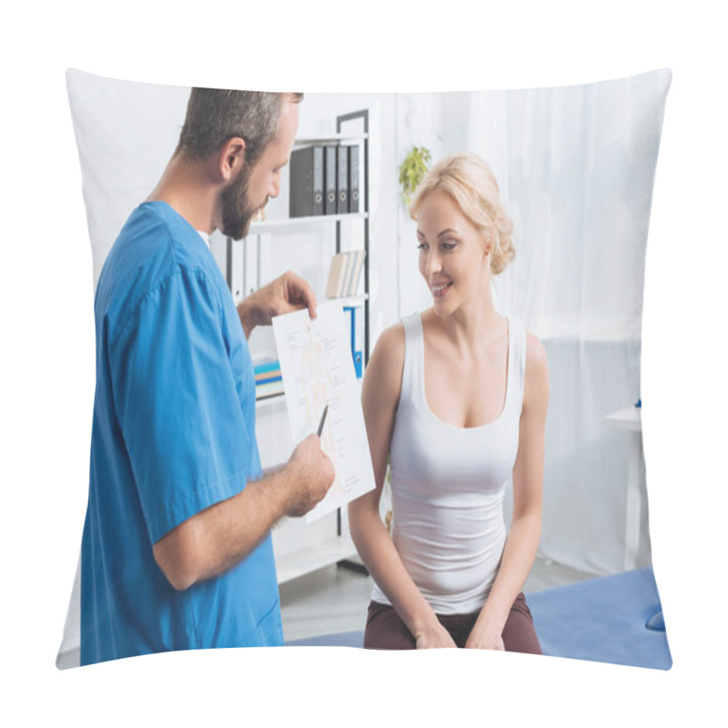 Personality  Physiotherapist Showing Human Body Scheme To Woman On Massage Table In Hospital Pillow Covers