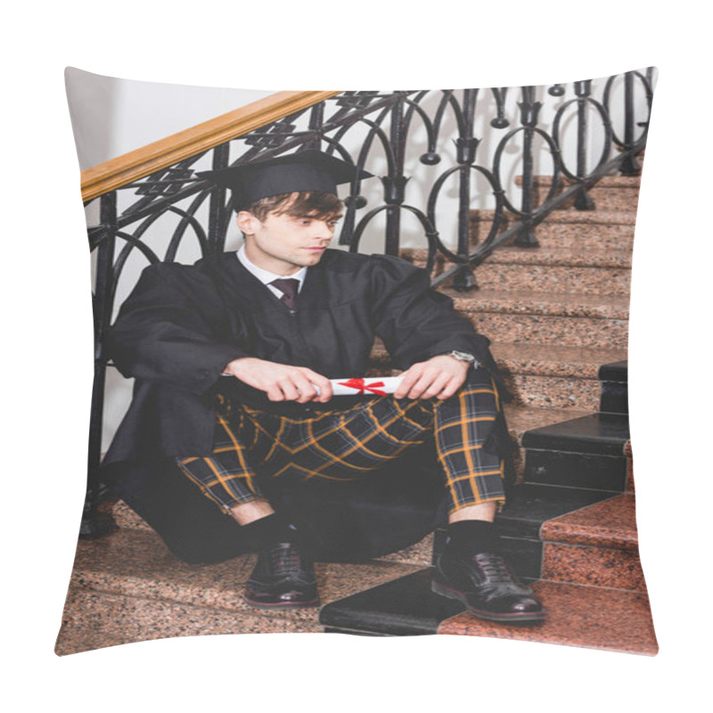 Personality  Handsome Student In Graduation Gown Sitting On Stairs And Holding Diploma  Pillow Covers