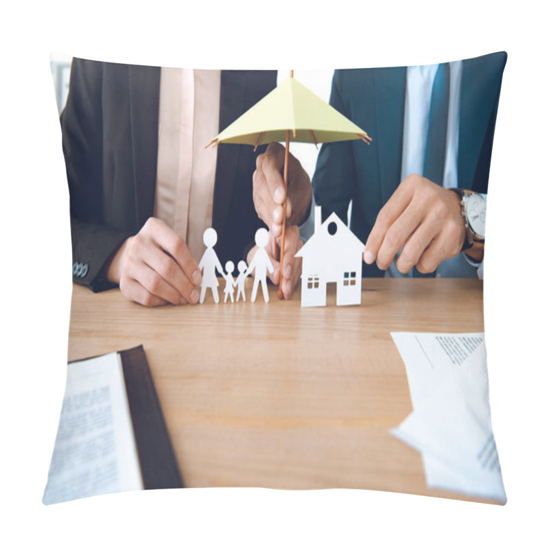 Personality  Partial View Of Insurance Agents Covering Family And House Paper Models With Umbrella At Workplace Pillow Covers