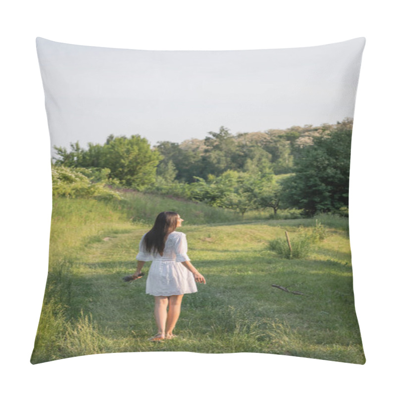 Personality  Back View Of Brunette Woman In White Dress Standing On Rural Road Near Forest Pillow Covers