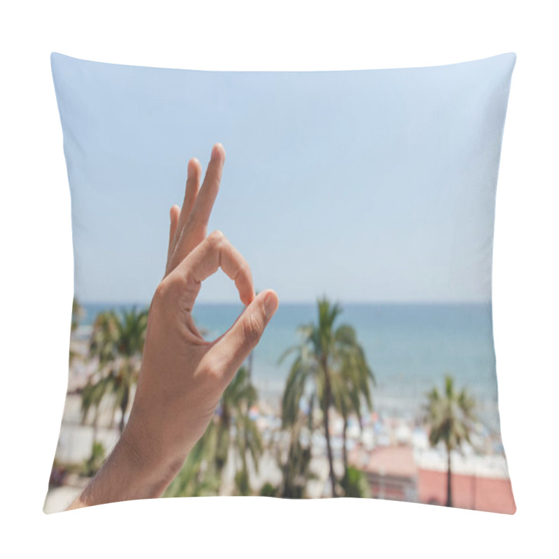 Personality  Cropped View Of Man Showing Okay Gesture With Palm Trees And Sea At Background In Catalonia, Spain  Pillow Covers