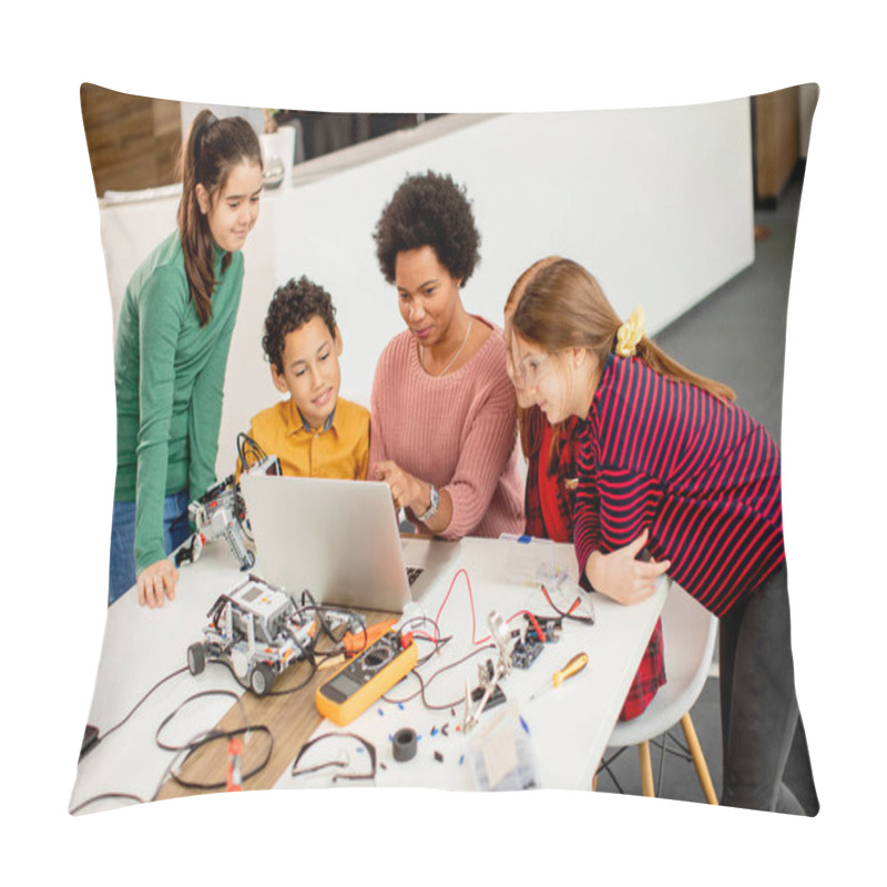 Personality  Group Of Happy Kids With Their African American Female Science Teacher With Laptop Programming Electric Toys And Robots At Robotics Classroom Pillow Covers