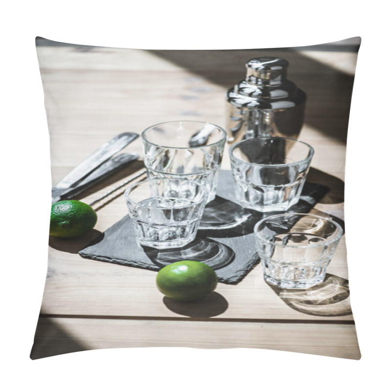 Personality  High Angle View Of Fresh Limes, Empty Glasses, Tongs And Shaker On Wooden Table  Pillow Covers