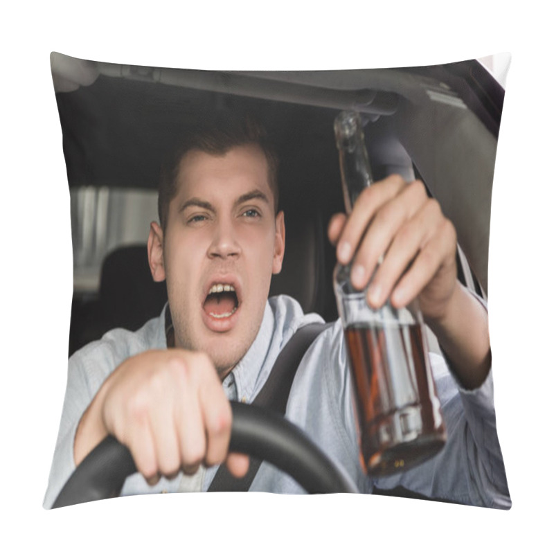 Personality  Drunk, Aggressive Man Shouting While Driving Car And Holding Bottle Of Alcohol On Blurred Foreground Pillow Covers