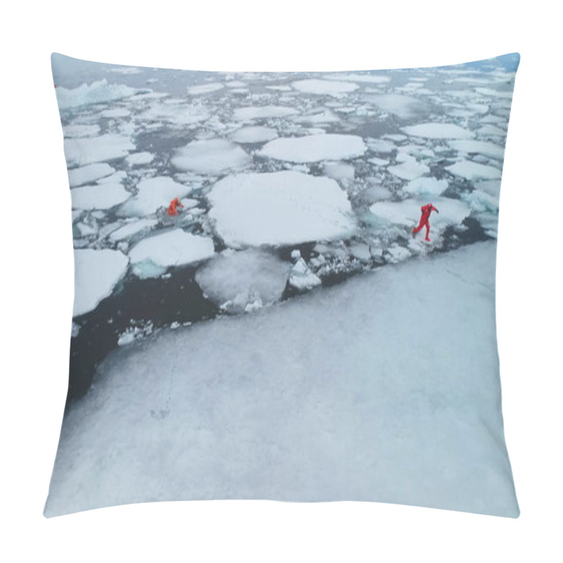 Personality  People In Antarctica Ocean Frozen Ice Floes. Two Man In Orange Immersion Suits Run Melting Ice, Polar Surface Trap, Fall In Cold Arctic Water. Explore Icebergs Climate Change, Global Warming. Aerial Pillow Covers