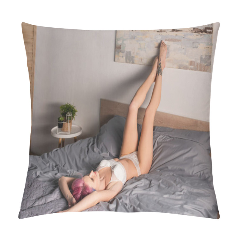 Personality  Tattooed And Seductive Young Woman In Sexy Underwear Lying With Legs Near Painting  Pillow Covers