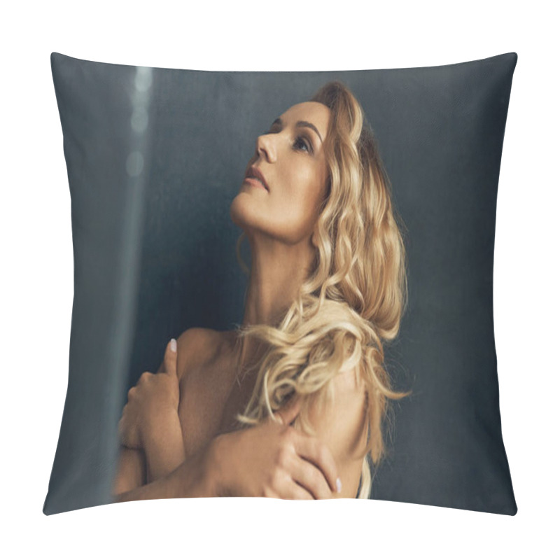 Personality  Portrait Of A Beautiful Woman With Long Blond Curly Hair, Professional Makeup, She Poses And Looks Up Hiding Her Breast Pillow Covers