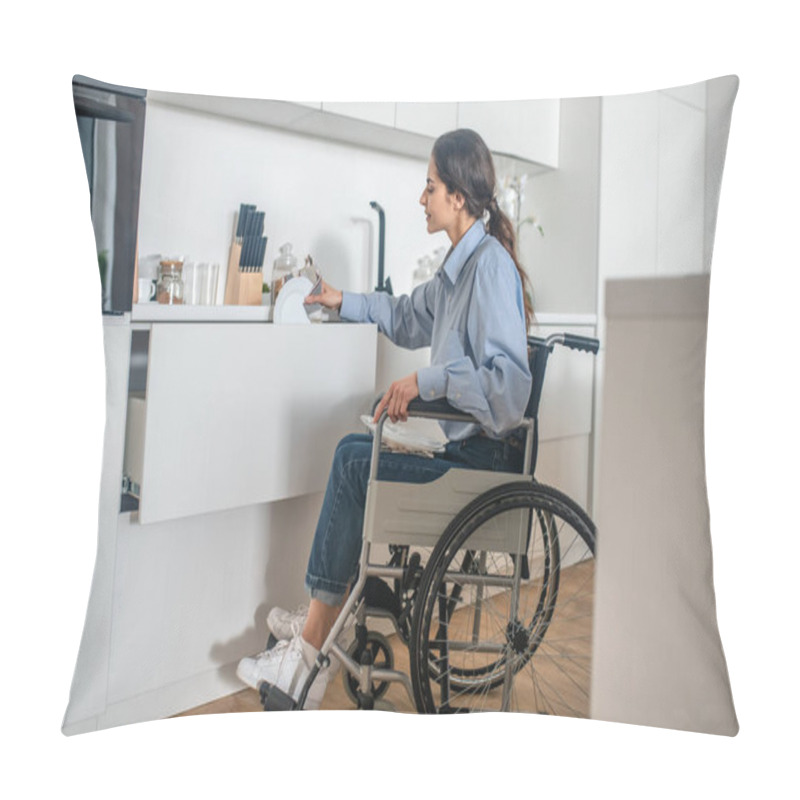 Personality  A Young Girl On A Wheelchair Doing Some Housework And Looking Involved Pillow Covers